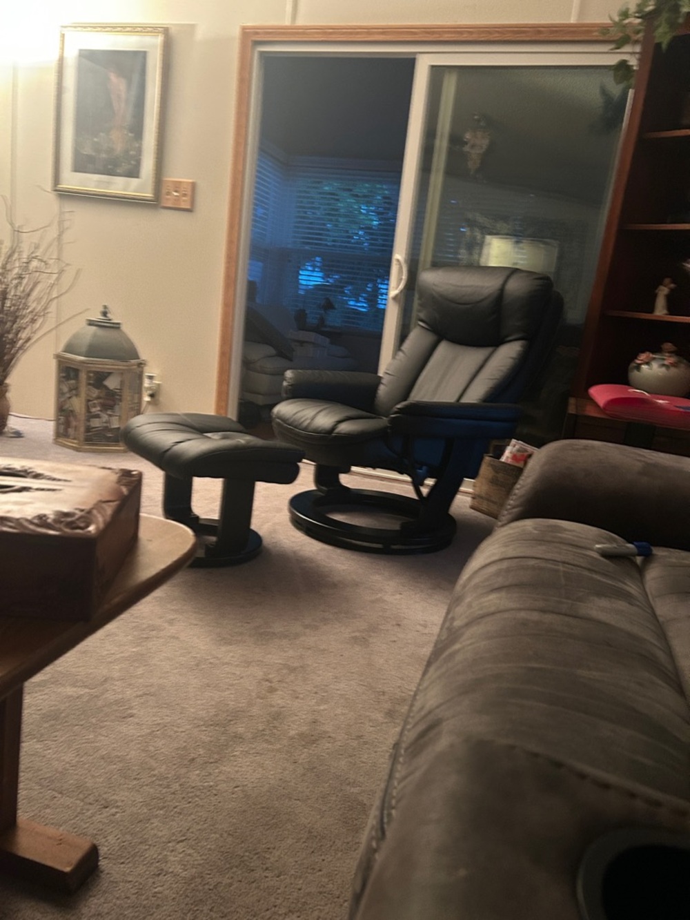 Black Leather Swivel Recliner with Ottoman